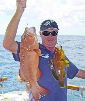 Peter, Skipper of the charter boat Lady N, shows that having two hooks pays off when coral trout are around North West Island.